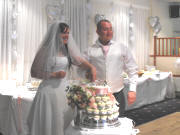 cutting the wedding cake